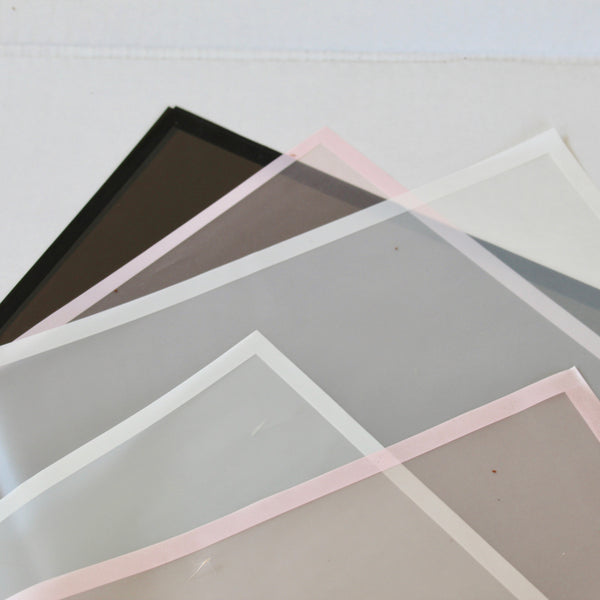 FROSTED /PLASTIC BOUQUQUET WRAPS - Floral Props and Design 